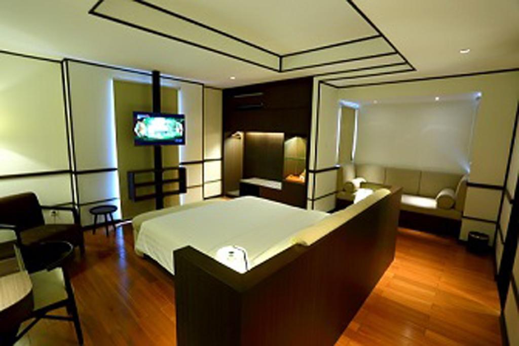 Namin Dago Hotel Бандунг Номер фото