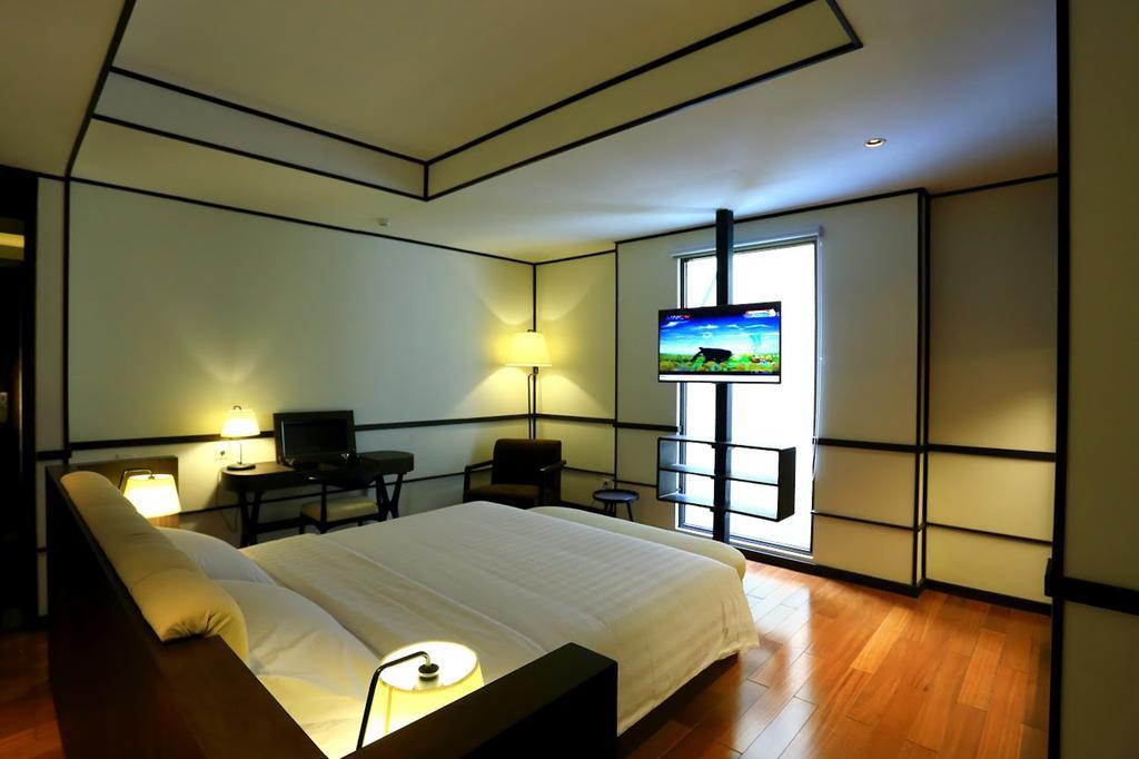 Namin Dago Hotel Бандунг Номер фото